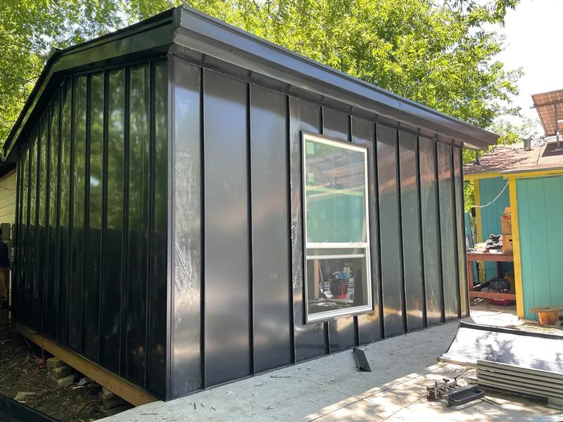 Black standing seam metal wall panels for Roof Inspection in Martinsville