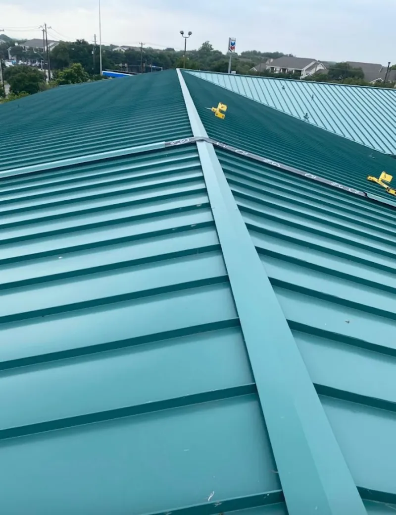 Green commercial metal roof ridge and valley for Metal Roof Repair in Martinsville